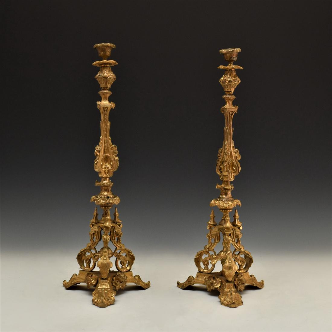 A PAIR OF BAROQUE STYLE BRONZE ALTAR CANDLESTICKS (1 of 2)