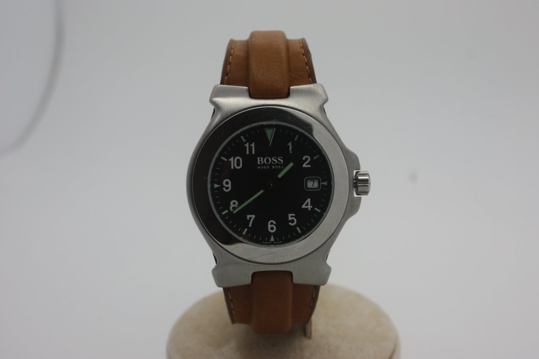Hugo Boss, Swiss Made: Swiss Made wristwatch, New old stock from 1970's, registered Model, Swiss Made, Stainless Steel, Water-resistant 50 M, quartz, Date @ 3oclock