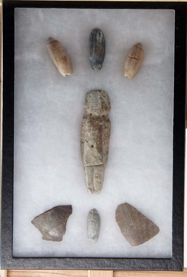 MEXICAN ORNAMENTAL ANTIQUE CARVED SHELLS AND STON: Title: seven objects from sea-shells, stone, one apparently human figure, with a label verso" Mezla, 5000 years old, Guerrero, Mexico", various materials, all worked for various end uses,, , , , , , S