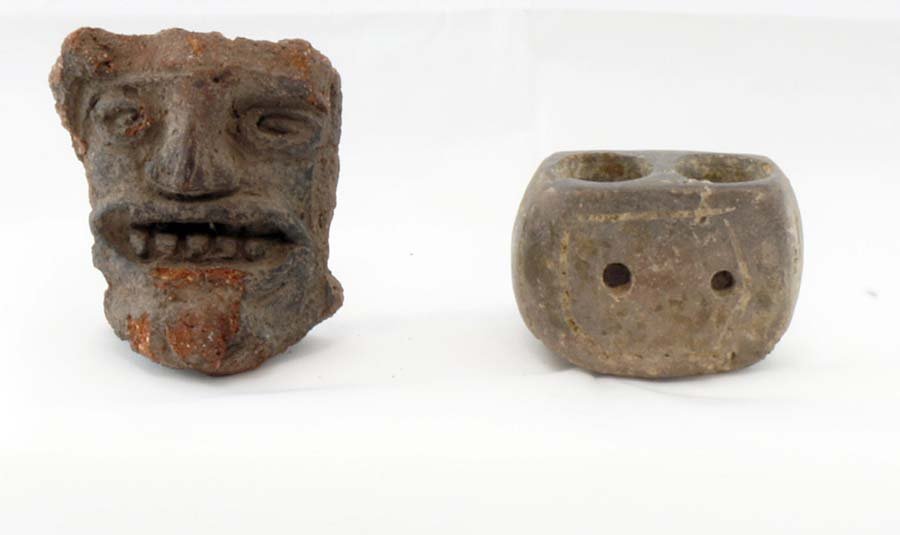 PRE-COLUMBIAN ARTIFACTS:: One Devil Totem and sash cord holder? Condition: In very good condition. Face may be part of another work. Size: 2 1/4 in. (6 cm.) and smaller Note: Work is believed to be pre-columbian, from Mezo-Ame