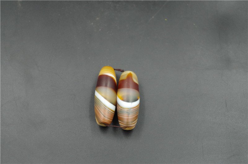 A Pair Chinese TIBETAN DZI BEADS (1 of 3)