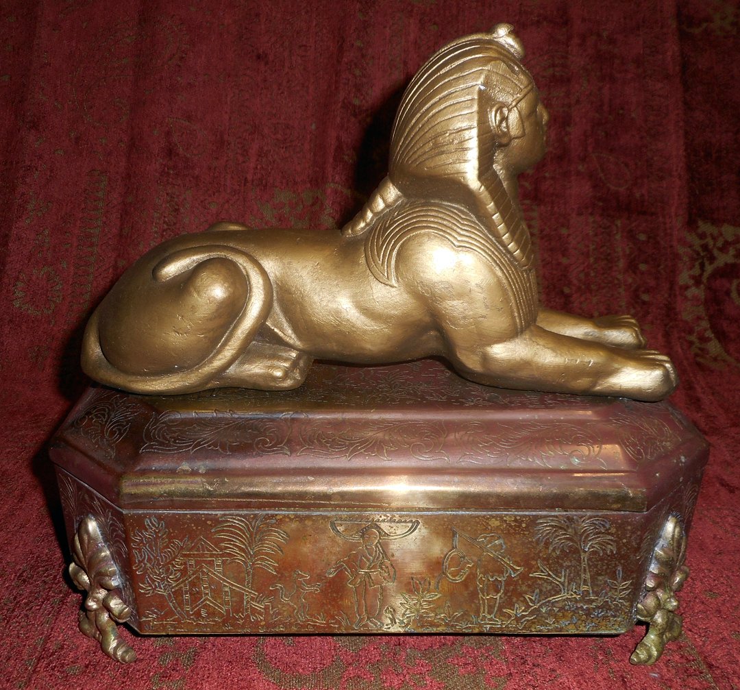 Large Egyptian Revival Art Nouveau Covered Box: This is an Egyptian Revival Covered Box and is made of a few different metals including copper as one of them.The dimensions of the box are 9 inches high, 11 inches long and 5 inches wide.