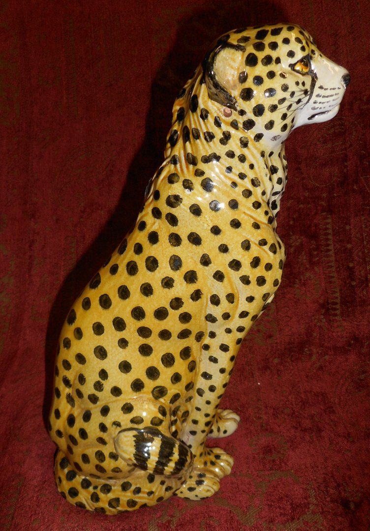 Italian hand painted and glazed terracotta Cheetah: This auction is for a beautifully crafted Italian hand painted and glazed terracotta animal sculpture of a cheetah. The piece appears to be mid century 50's or 60's. Similar pieces have sold on other