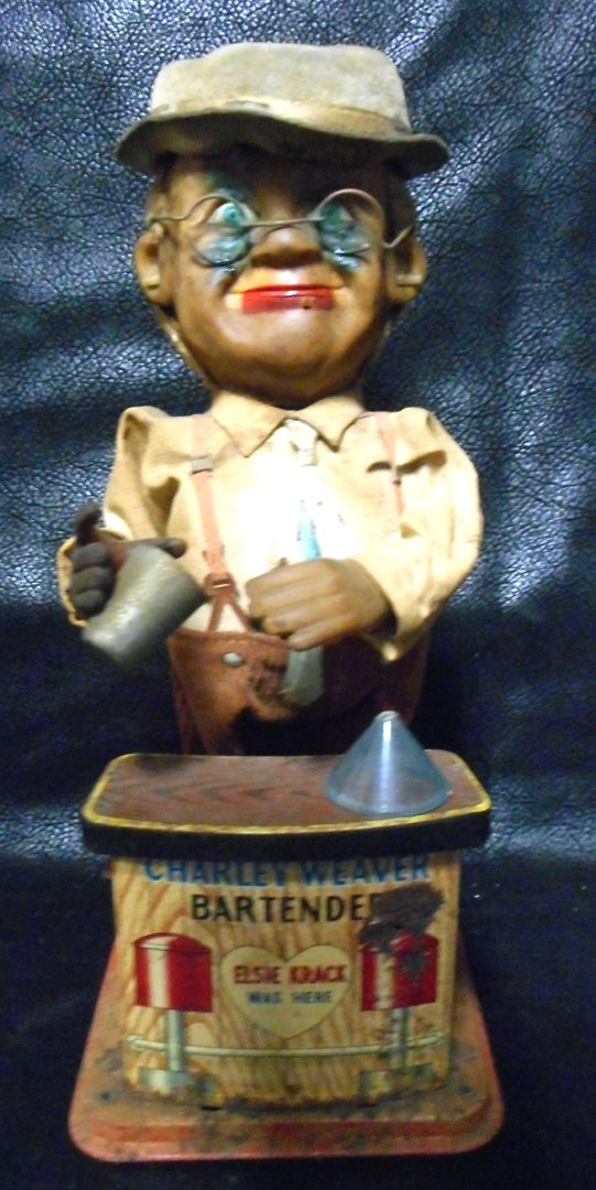Charlie Weaver Bank: I don't know how old this bank is but it is not new. I have no information on the bank but I am sure you can find something online.WIN 5 ITEMS IN THIS AUCTION AND YOU CAN CHOOSE (YOUR CHOICE) A 6TH TH