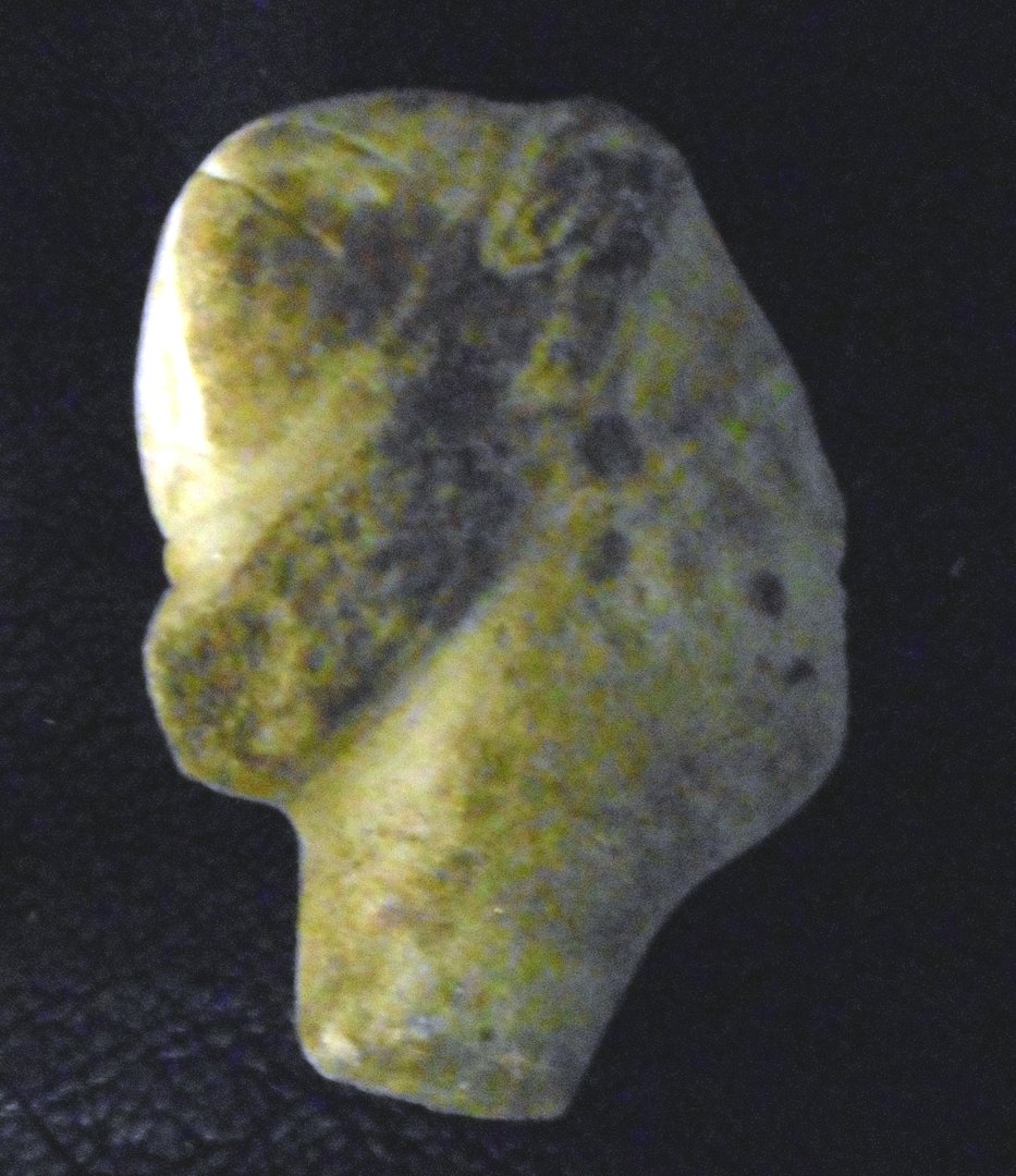 Ancient Egyptian Artifact: This very old artifact is believed to be Egyptian. It is a head of a very old sculpture. The object is carved of marble and it's size is about 3 inches in height.WIN 5 ITEMS IN THIS AUCTION AND YOU CA