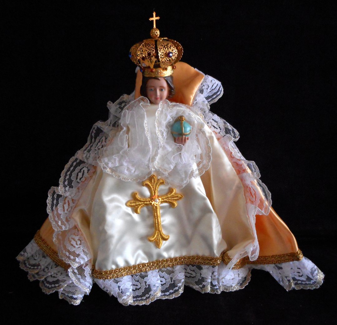 Infant of Prague with beautiful garments: This Icon is about 12 inches tall and has beautiful garments.