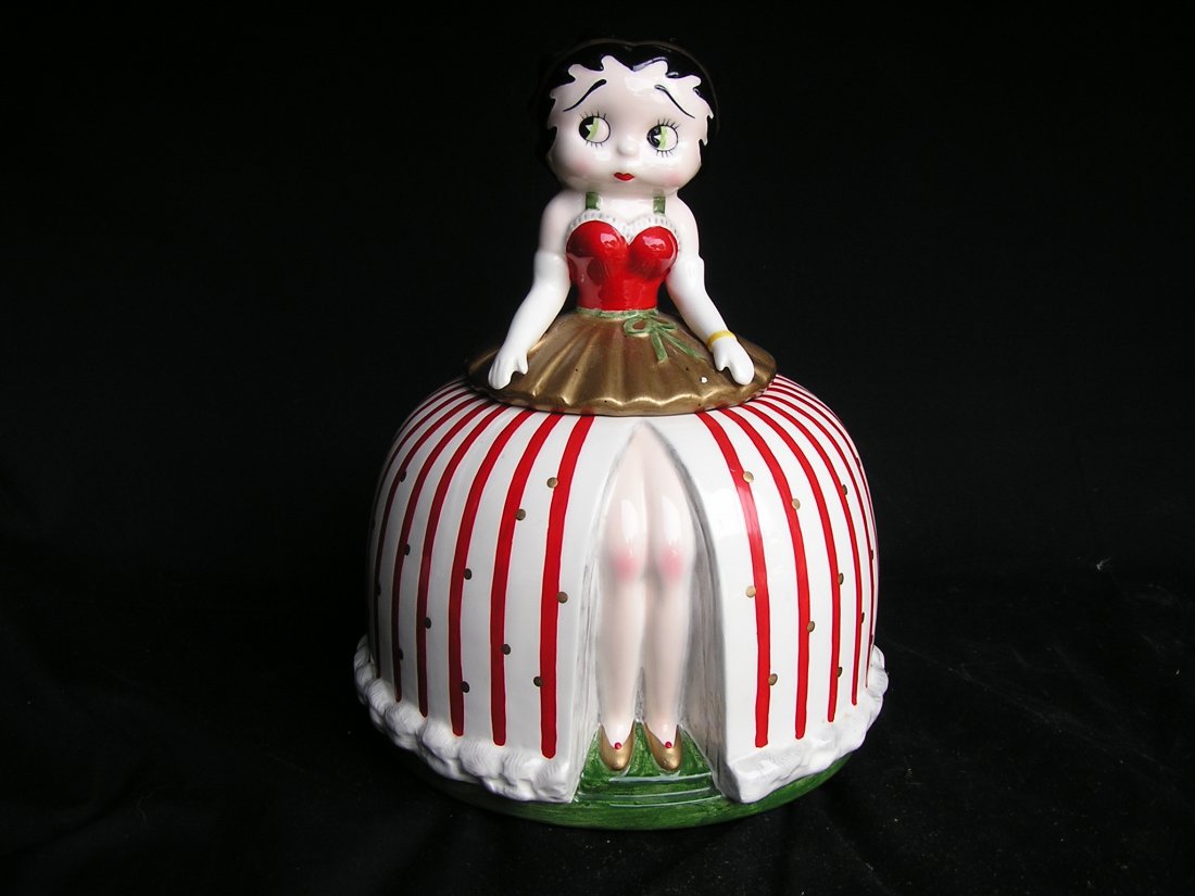 Betty Boop Cookie Jar with Peppermint Dress: This is a great Betty Boop Cookie Jar. She is dressed for the holidays & is in excellent condition. She does have a couple of paint rubs on the gold, but nothing that detracts from the overall look. S