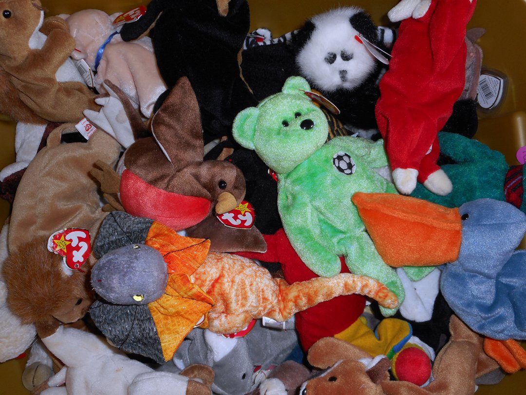 77 Beanie Babies Collection: This was a small collection of Beanie Babies. 9 of them in plastic boxes and the rest are loose. They came from a smoke free environment (a warehouse)All are in very good condition with tags.