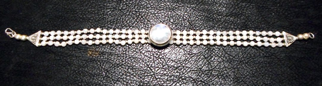 Silver and White Stone ? Choker: Sorry! I don\'t know what stone this is. It is definitely set in silver 9.6.
