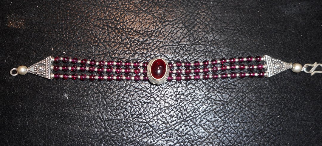 Silver and Garnet Bracelet: Just like the choker, I am not sure that the stone is a garnet.It is definitely set in silver.