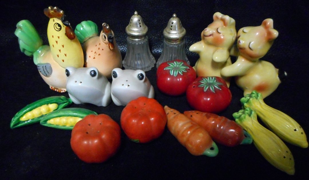 9 Salt and Pepper Sets: Great deal. 9 Salt and Pepper Sets. A rooster and chicken, 2 rabbits, 2 frogs, 2 tomatoes, 2 ears of corn, 2 celery stalks, 2 carrots, two orange vegetables and a set of crystal s and p's.