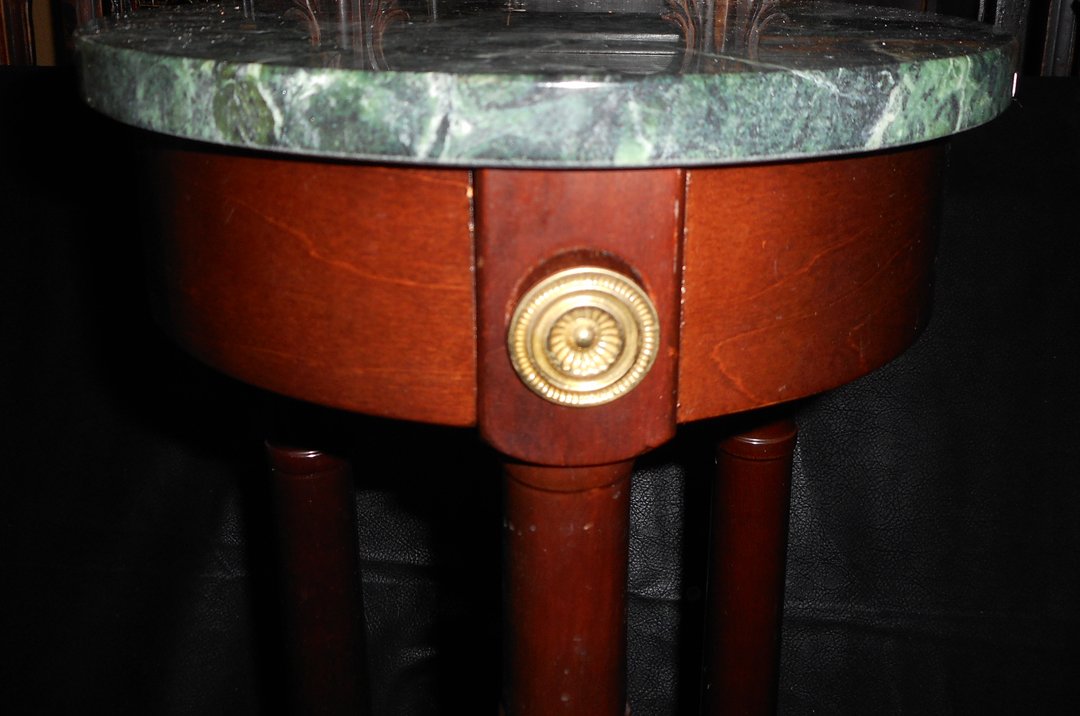 Tall 3 legged Bombay Marble Top Table: This table has been sold at the Bombay company for years. I think it sells for about $129. now.This ships easily because it comes apart.
