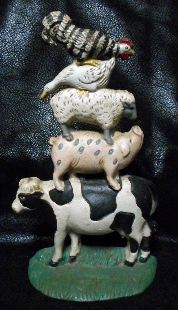 Vintage Barnyard Cast Iron Door Stop: Awesome cast iron doorstop of barnyard animals. The height of this doorstop is about 12 inches.