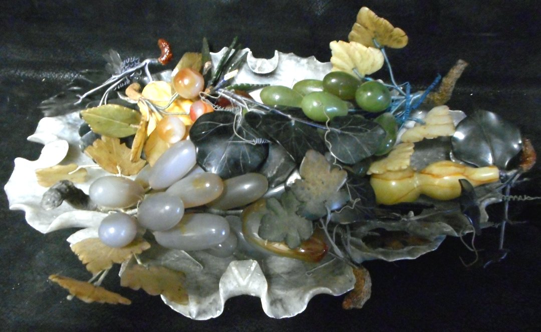 Soapstone Leaf Bowl with Marble Grapes: Awesome soapstone leaf bowl. It is filled with grapes made of various stones including marble. Bowl is about 13 inches long.