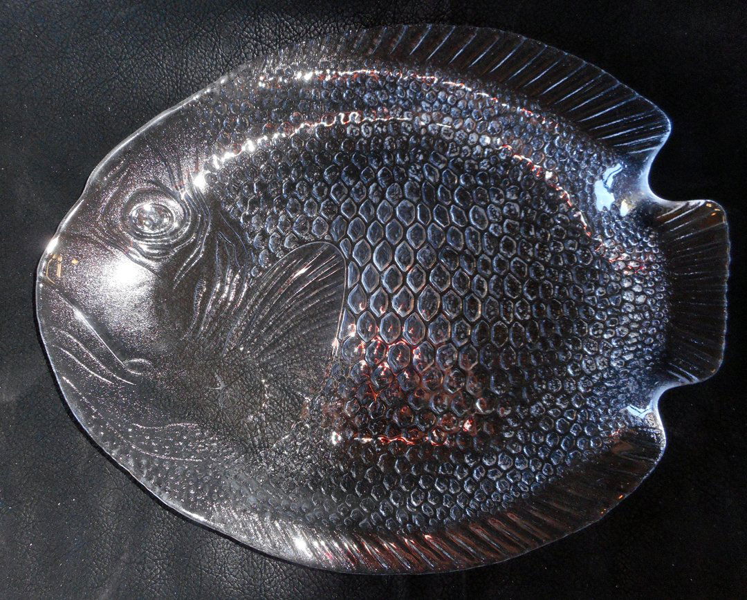 One Dozen Mid Century Fish Plates (1960's): This is a set of 12 large Fish Plates (about 12 to 14 inches)I am only showing one in the pictures. Each plate is valued at about $20. They are from the 1960's and are an opaque clear.