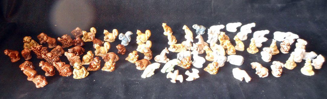 100 Animals, Jungle, Forest, Monkeys Wade Figurines: This is a collection of 80 Wade, mostly Animal Miniatures. They are all about 1 inch high. They are sculpted well and have surprisingly alot of detail. There are Tigers, Giraffes, Monkeys, Bears, Bird