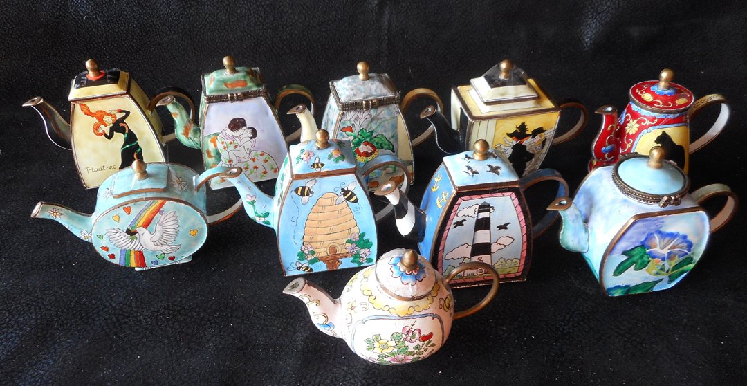 10 Miniature Teapots by Kelvin Chen: This collection is 10 Miniature Teapots by Kelvin Chen. They are all about 2 inches high and are extremely well done and decorated. On other auction sites, the ones I have in this collection have sold