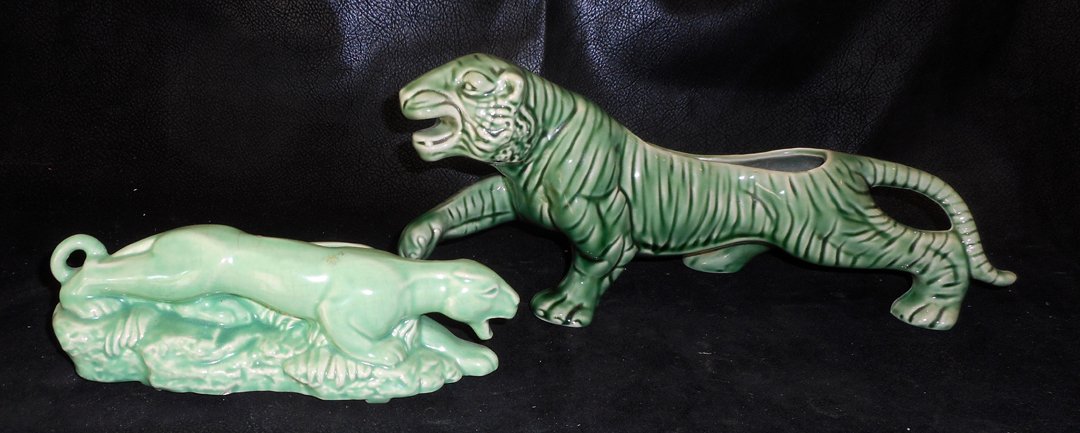 A pair of Mid Century Panther planters: Jade Green: Two great green panther planters from the 1950's. This color is the collectible color. Not as common. Selling on ebay for $35. to $45. each.