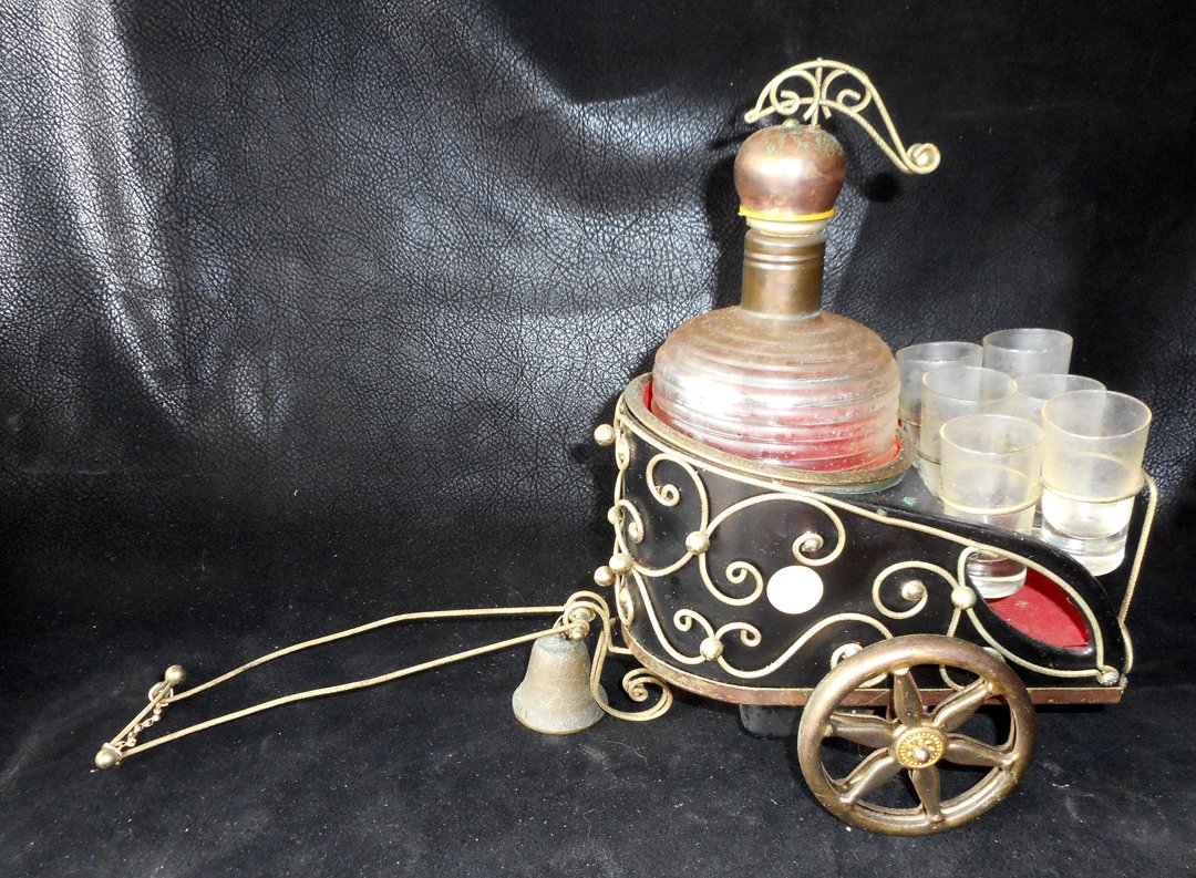 Egyptian or Roman Chariot Decanter and 6 glasses: Very Unusual Chariot Decanter and 6 shot glasses. Picture says it all. It needs a cleaning.