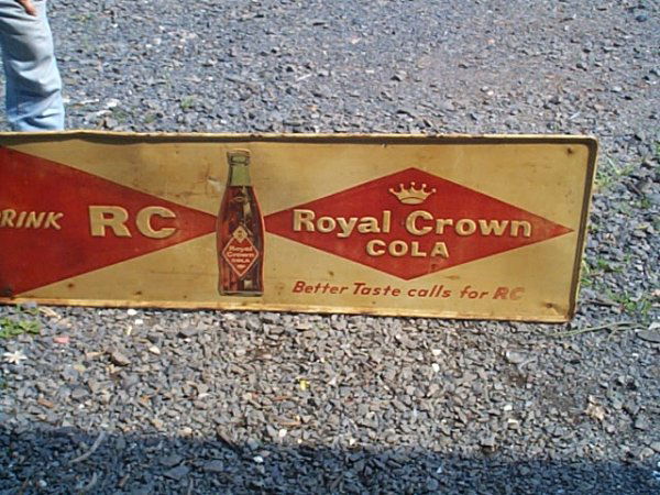 Antique tin sign Royal Crown Cola, Drink RC. Meas: Antique tin sign Royal Crown Cola, Drink RC. Measures 18" tall by 51" long. Local delivery available within a 60 mile radius of Somerset, NJ, local delivery fee is $125 in state or $175 out of state,