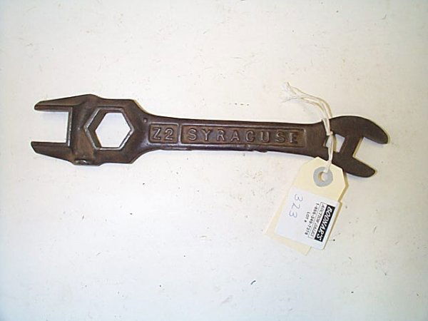 Vintage, cast iron multi tool wrench, stamped Syra: Vintage, cast iron multi tool wrench, stamped Syracuse Z2. Measures 10.5" long. Buyer to pay $20.00 shipping and handling, all items to be sent USPS Priority Mail with Delivery Confirmation. Insurance