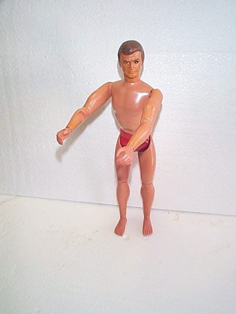 Kenner Bionic Man Action Figure with push spring: Kenner Bionic Man Action Figure with push spring on back. Measures 13" tall. Buyer to pay $20.00 shipping and handling, all items to be sent USPS Priority Mail with Delivery Confirmation. Insurance is