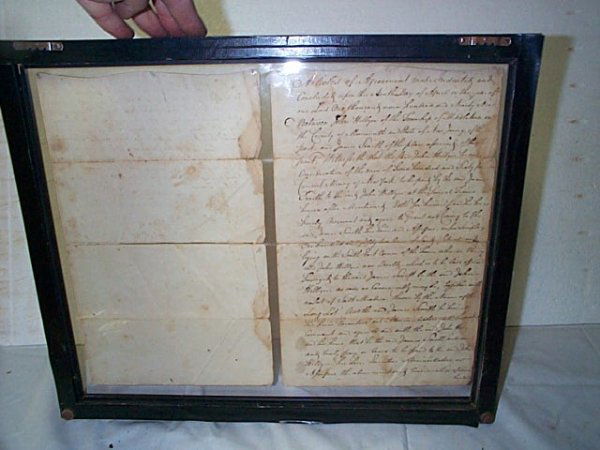 Framed hand-written deed. Agreement made on Apri: Framed hand-written deed. Agreement made on April 6, 1799 in Middletown, Monmouth County, NJ. Signed by James Smith and John Hillyn with seal marks. Has creases and some water damage. Otherwise, OK co