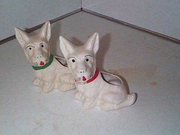 Pair of American pottery Scottie dog planters. Meas