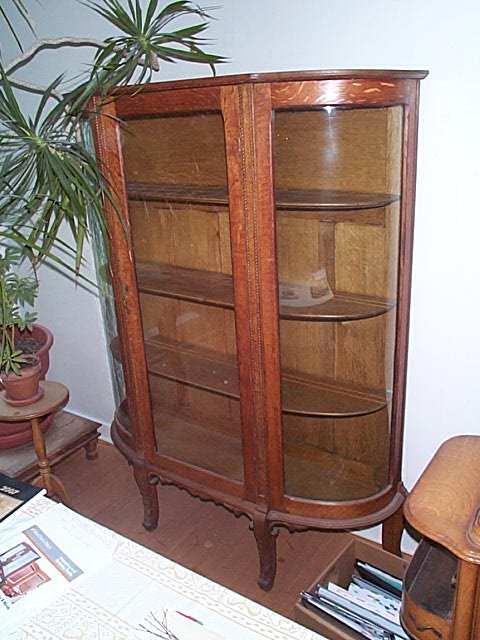 oak bow-front china closet. Item can be picked up