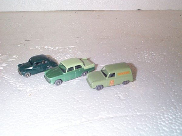Lot of 3 vintage Matchbox cars including #59 Ford: Lot of 3 vintage Matchbox cars including #59 Ford Thames van "Singer Sewing Machine", #29 Austin A55 Cambridge - two-tone color, and #46 Morris Minor 1000. All in very good to excellent condition. Buy