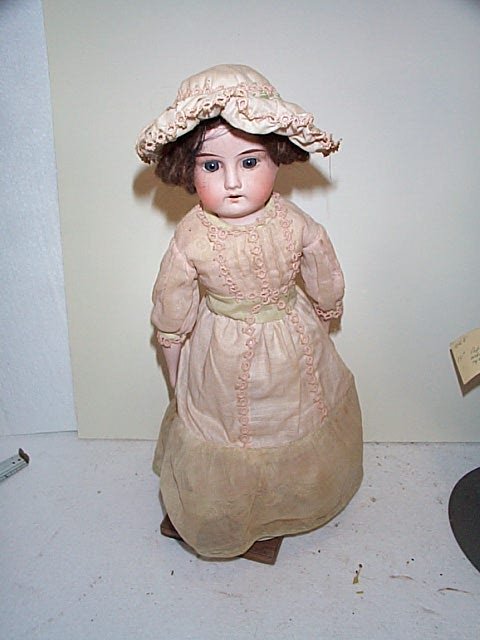 16" bisque shoulder, porcelain head girl doll. Ma