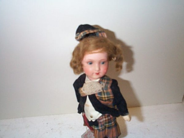 German painted bisque head doll in a Scottish moti - 2