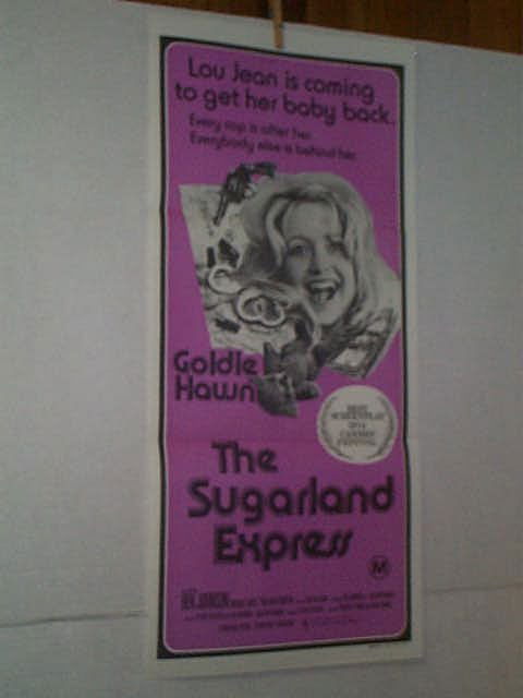 Original movie poster. Insert. "THE SUGARLAND EXP: Original movie poster. Insert. "THE SUGARLAND EXPRESS". GOLDIE HAWN, BEN JOHNSON, MICHAEL SACKS, WILLIAM ATHERTON. Marked lower right. M.A.P.S. LITHO PTY. LTD. Measures 30 inches by 13 1/4 inches. Buy