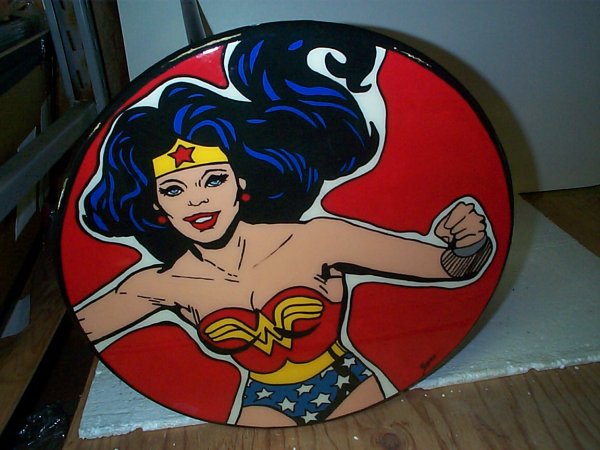 Signed hand painted Wonder Woman card table. Top