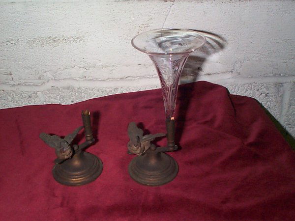 pair of mix-metal epergnes with bird motif one mis: pair of mix-metal epergnes with bird motif one missing insert, measures 3 inches tall. Buyer to pay $20.00 if you live on the East Coast, Mid West buyer pays $25.00, West Coast buyer pays $30.00 shipp