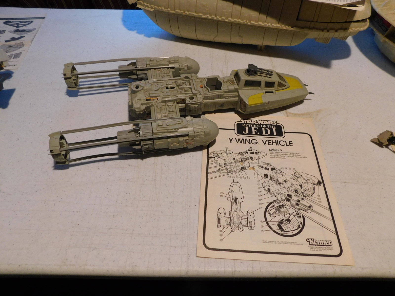 Vintage Y Wing Vehicle: Vintage Star Wars Return of the Jedi Y Wing Vehicle with original booklet, appears to be complete with launching rocket. In good condition. You are bidding at a live sale. Please Read the terms and co