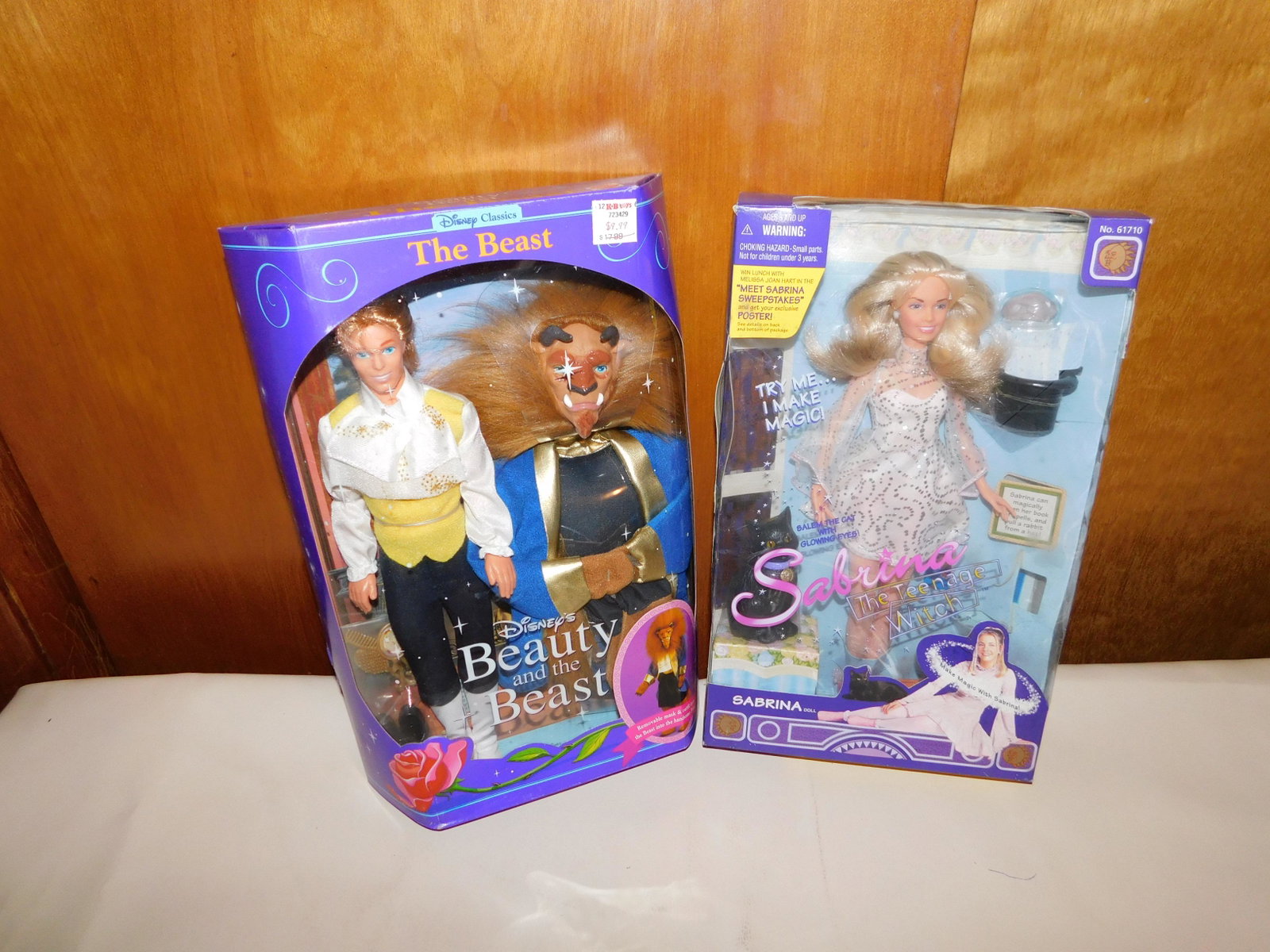 Lot of 2 Dolls: Lot of 2 dolls including Disney's Beauty and the Beast - The Beast, and Sabrina the Teenage Witch doll. Both in original boxes. You are bidding at a live sale. Please Read the terms and conditions. We