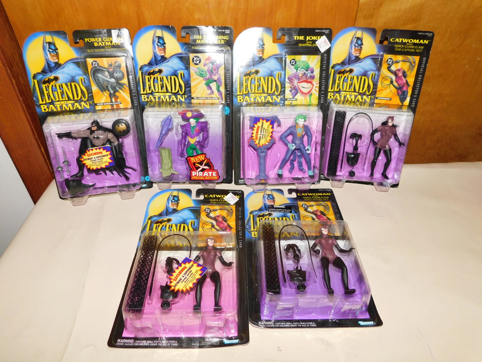 Lot of 6 Batman figures: Lot of 6 Batman action figures including 3 Legends of Batman Catwoman with quick climb claw and capture net, The Joker with snapping jaw, Power Guardian Batman and The Laughing Man Joker with powerful