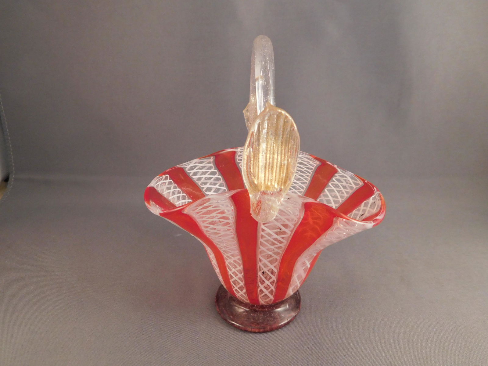 19th c Venetian Glass Basket: 19th c hand blown venetian glass basket. Measures approx. 5" tall x 4" wide. You are bidding at a live sale. Please read the terms and conditions. We are offering no contact pick up at our South Bruns