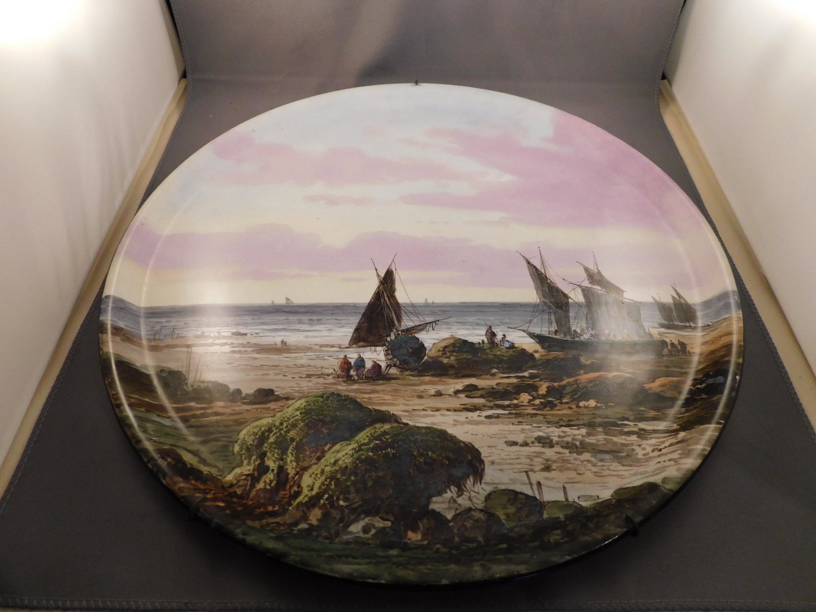 Hand painted Charger: China Sarreguemines hand painted charger. Measures approx. 14 1/4" across. You are bidding at a live sale. Please read the terms and conditions. We are offering no contact pick up at our South Brunswi