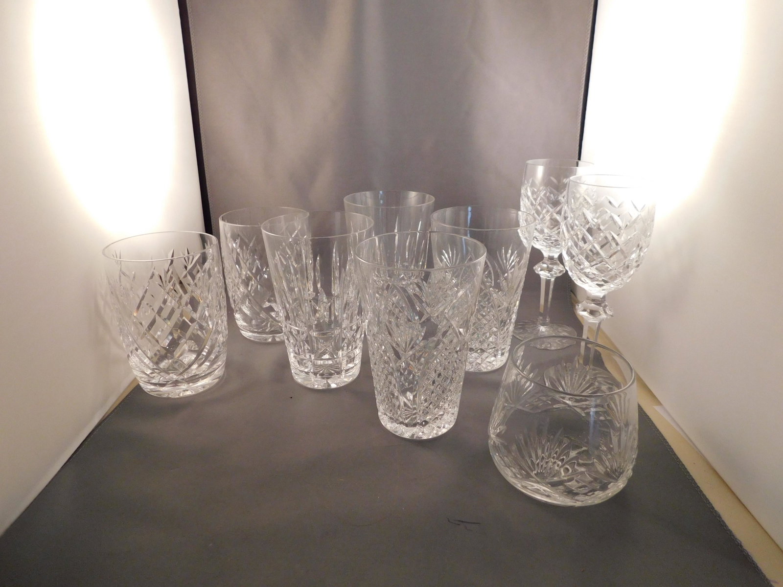 Lot of Waterford Glasses: Lot of Waterford glasses including 3 water glasses in 2 patterns, 2 rocks glasses, 2 wine stems and one rocks glass that is unmarked - possible Waterford Marquis. Measures approx. 3" - 6 1/2" tall. Yo