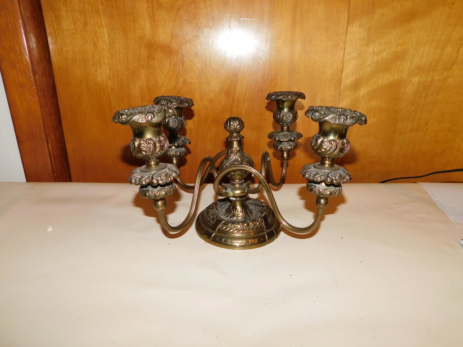 Victorian White Metal Candelabra: Victorian mixed metal candelabra. Marked Middletown Plate. Measures approx. 7 3/4" tall x 13 1/4" wide. You are bidding at a live sale. Please read the terms and conditions. We are offering no contact