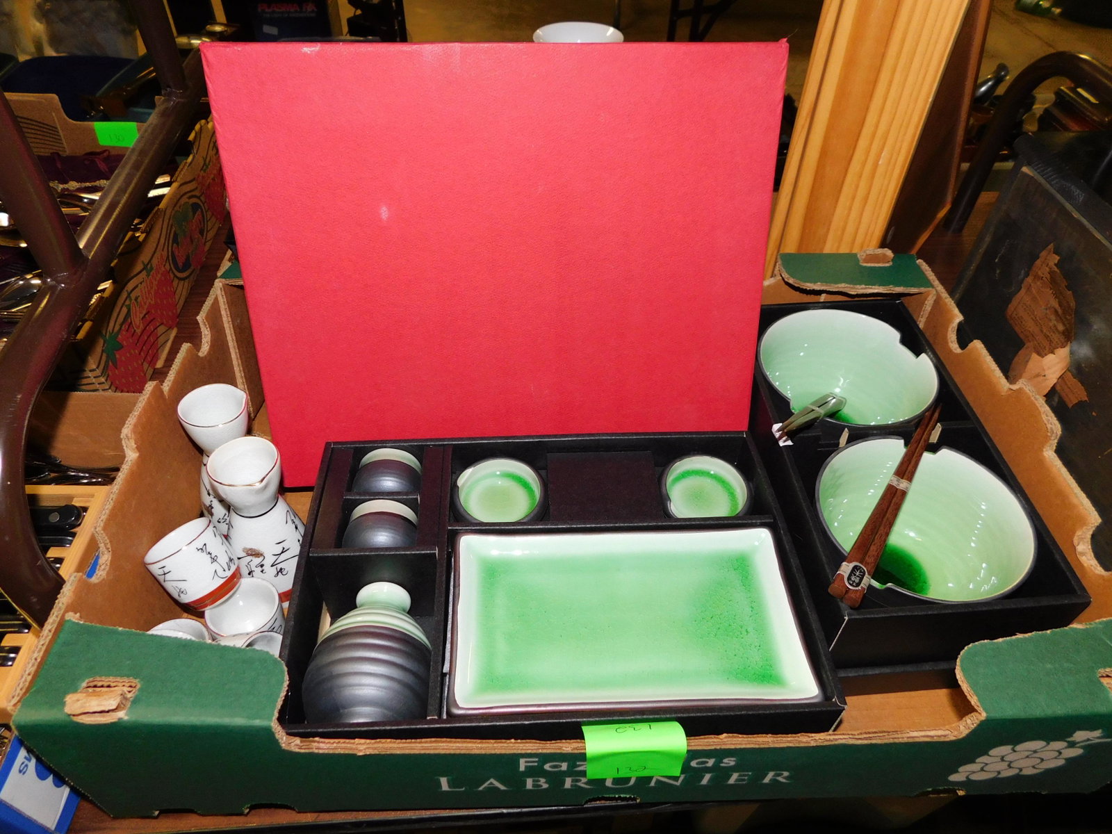 Lot of Asian Dinnerware: Lot of Asian dinnerware in boxes. You are bidding at a live sale. Please read the terms and conditions. LOCAL PICK UP ONLY! No shipping options will be offered for this auction. After the auction by A