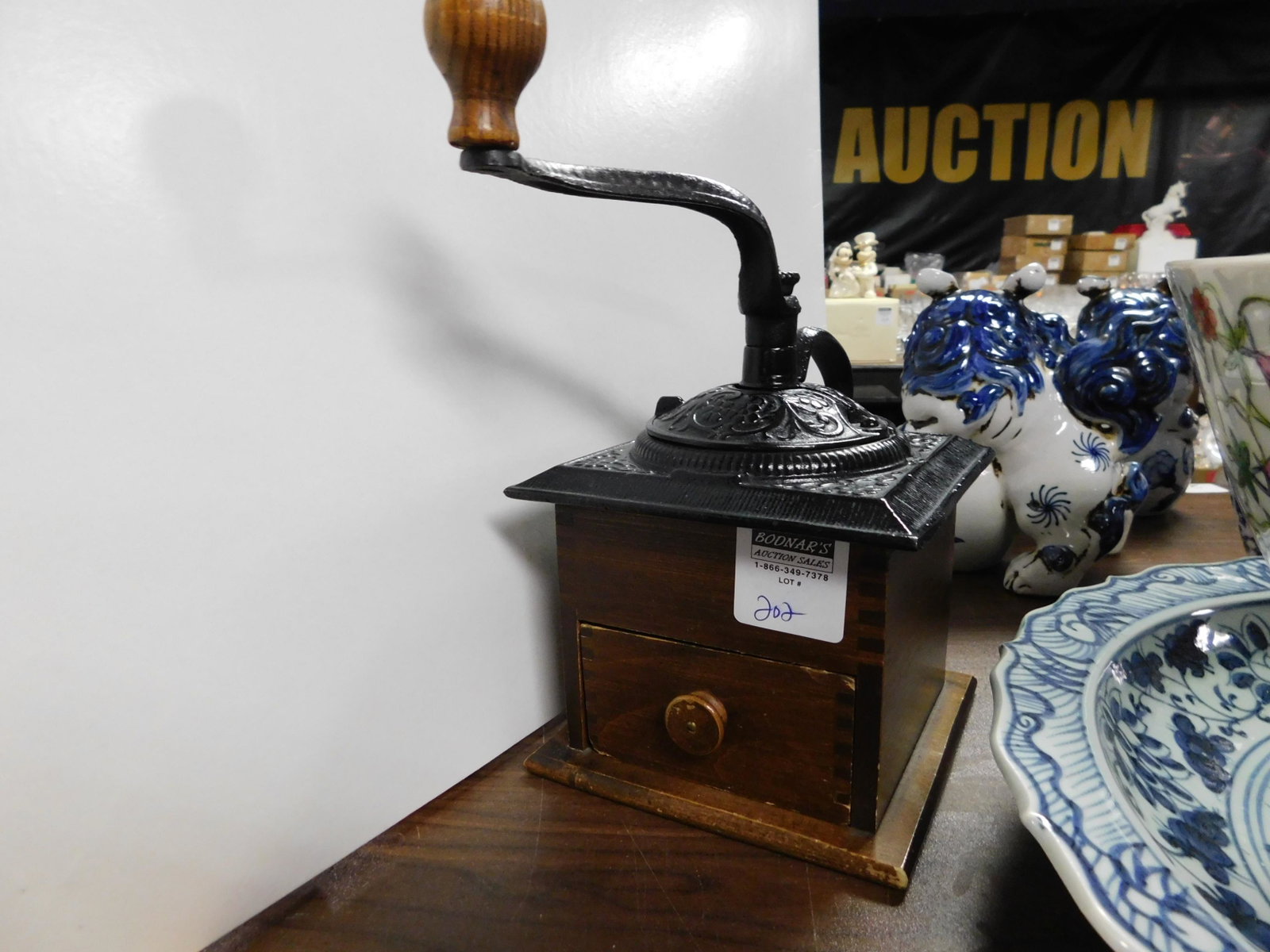 Coffee Grinder: Coffee grinder. You are bidding at a live sale. Please read the terms and conditions. LOCAL PICK UP ONLY! No shipping options will be offered for this auction. After the auction by APPOINTMENT pick up