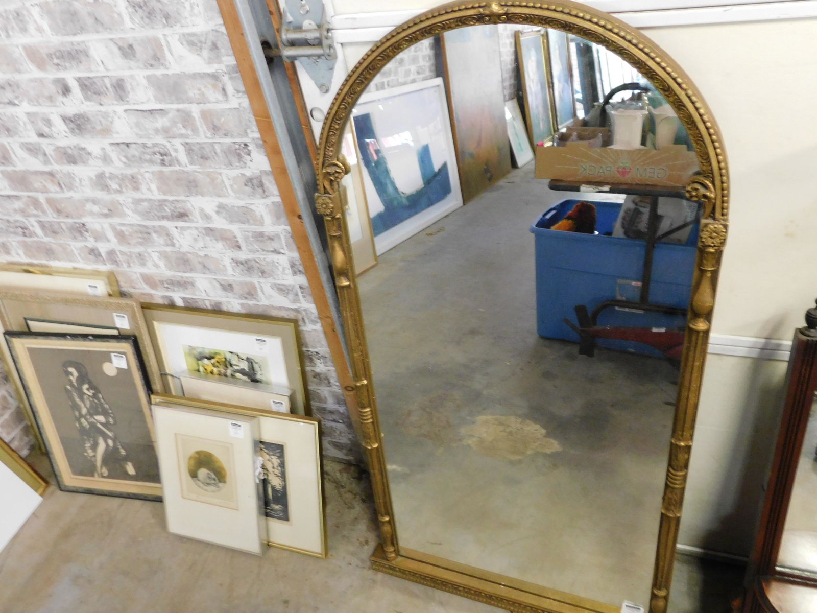 Gold Gilded Mirror: Gold gilded mirror. You are bidding at a live sale. Please read the terms and conditions. LOCAL PICK UP ONLY! No shipping options will be offered for this auction. After the auction by APPOINTMENT pic