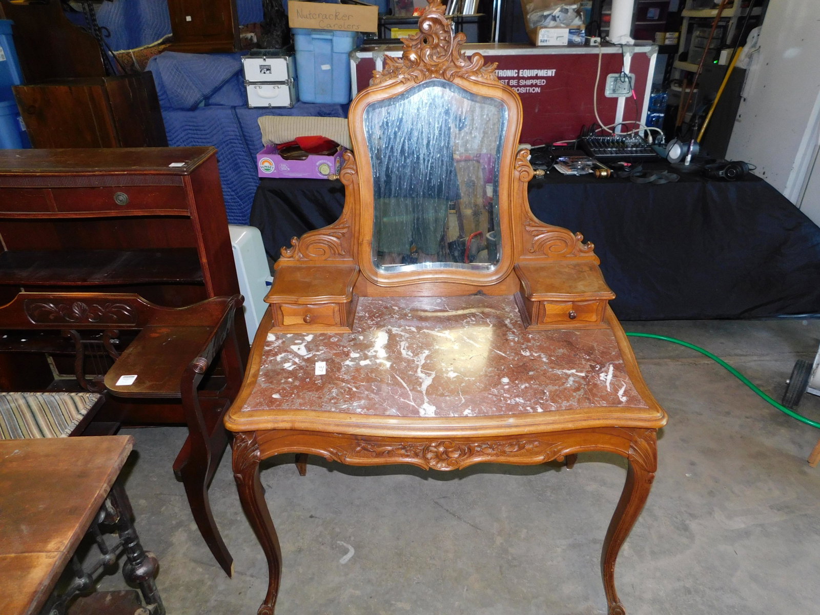 French Carved Marble Top Vanity: French carved marble top vanity. You are bidding at a live sale. Please read the terms and conditions. LOCAL PICK UP ONLY! No shipping options will be offered for this auction. After the auction by AP
