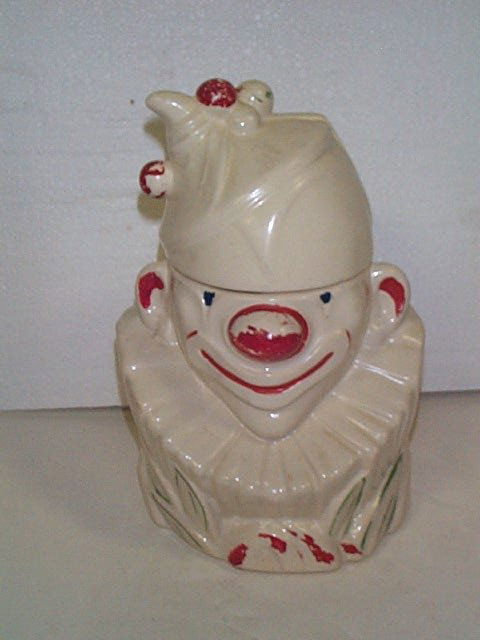 Signed McCoy Clown Cookie Jar Measures 10.5" tall: Signed McCoy Clown Cookie Jar Measures 10.5" tall Buyer to pay $20.00 if you live on the East Coast, Mid West buyer pays $25.00, West Coast buyer pays $30.00 shipping and handling, all items to be sen