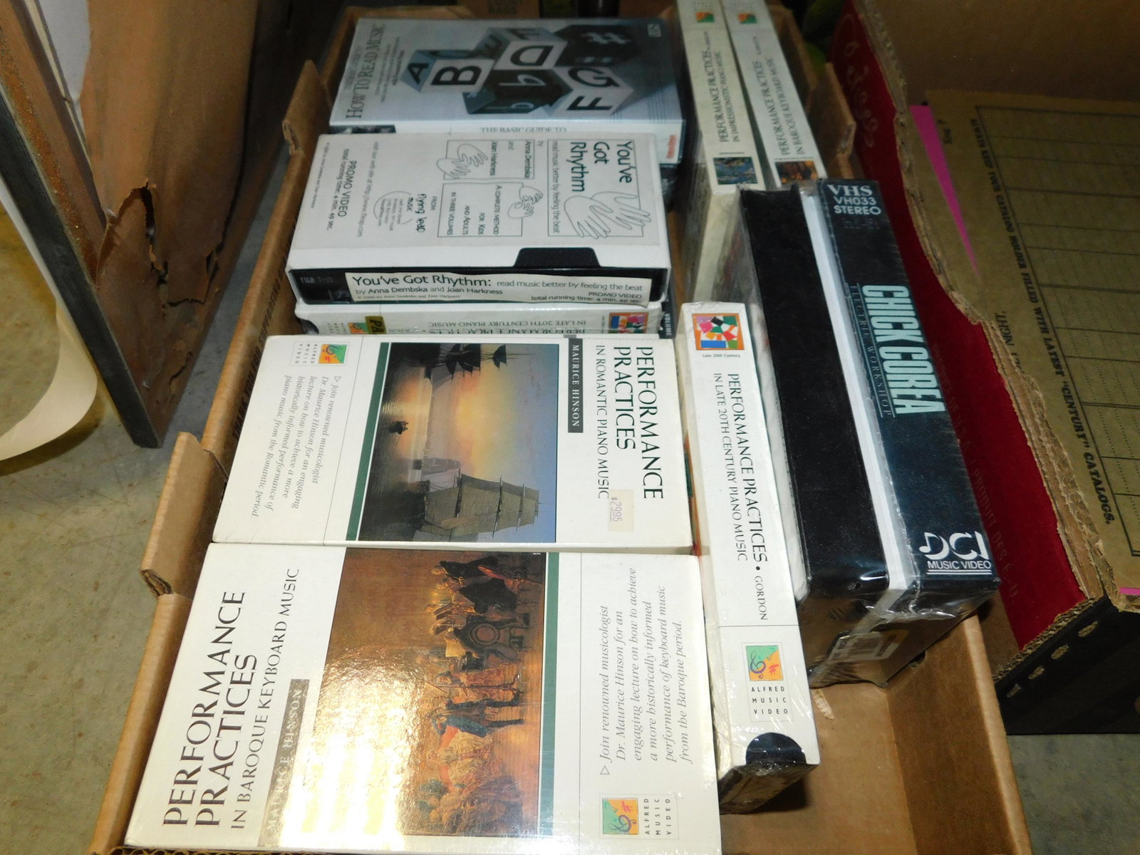 Lot of Piano VHS Tapes: Lot of VHS tapes on piano music, new in packaging, from a 75+ year old music store. You are bidding at a live sale. Please read the terms and conditions. This sale will be broadcast live on sale day w