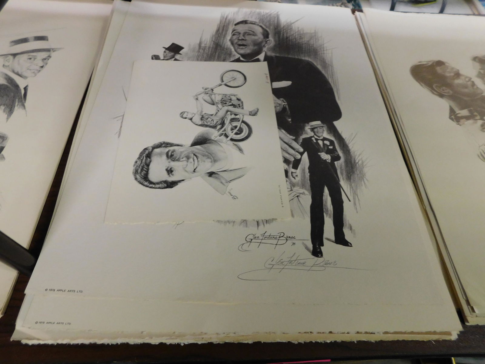 30 Unframed Lithographs: Lot of 30+ unframed lithographs of various movie stars - Bing Crosby, laurel and Hardy, Frank Sinatra, Burt Reynolds and others. You are bidding at a live sale. Please read the terms and conditions. T