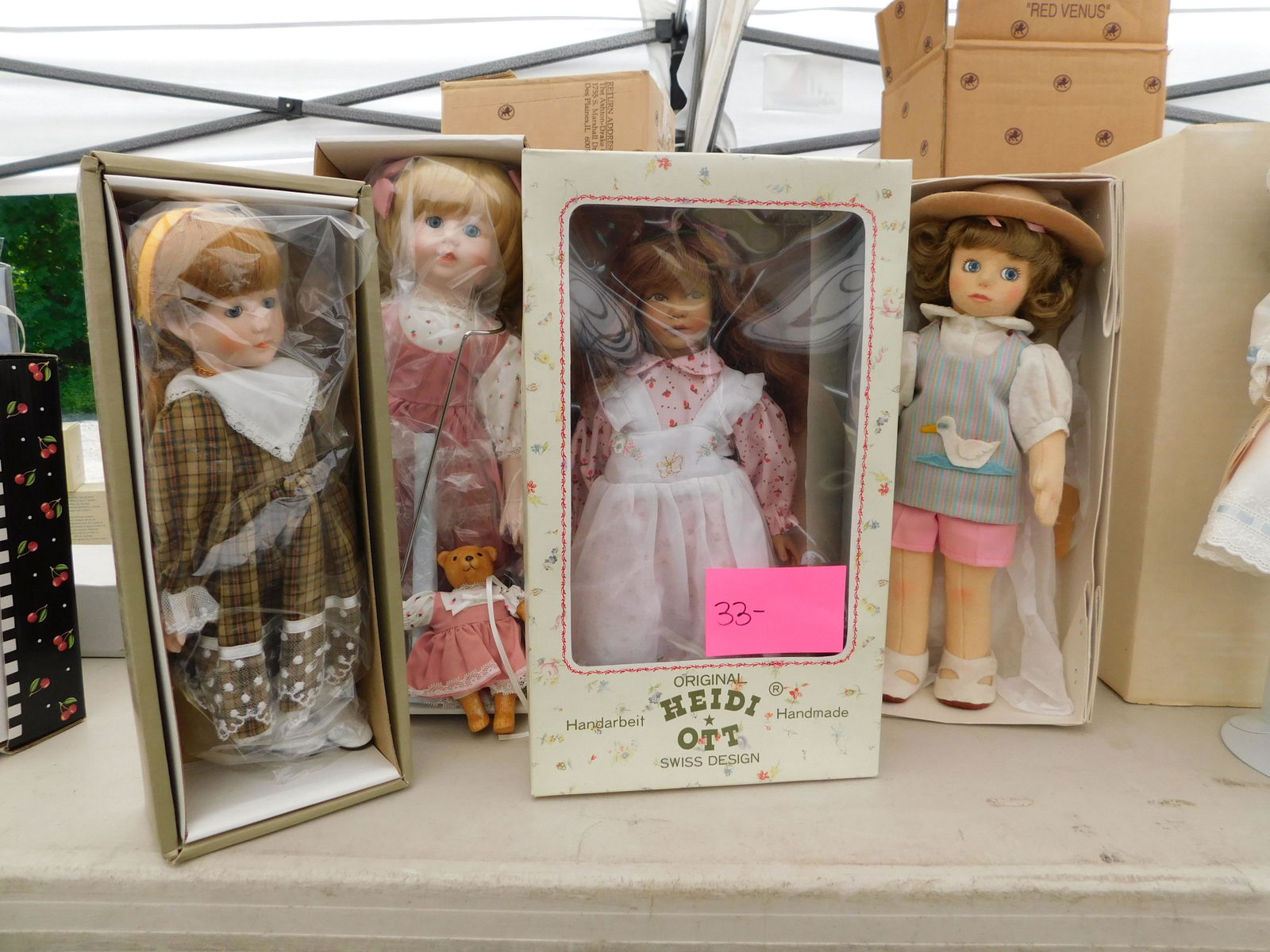 4 Dolls: Lot of 4 dolls in the original boxes. You are bidding at a live sale. Please read the terms and conditions. This sale will be broadcast live on sale day with full descriptions of each lot being sold,